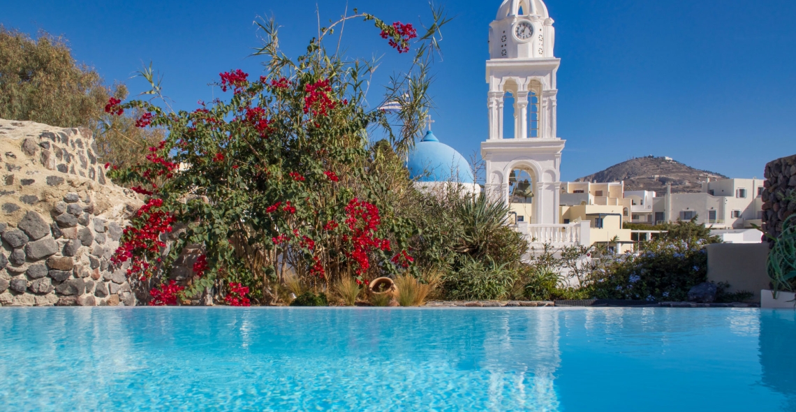 Private swimming pool at Mansion Kyani surrounded by Mediterranean garden