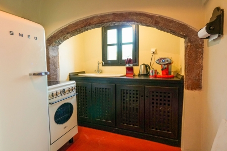 Kitchen with Smeg appliances of Mansion sophia heritage villa in Megalochori Santorini