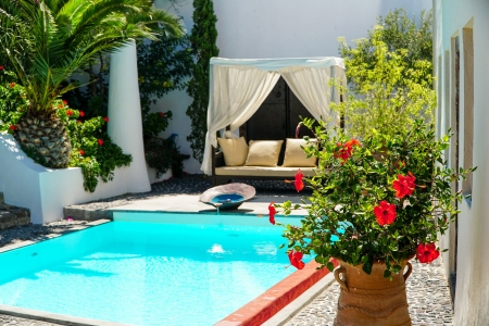 Mansion sophia heritage villa private pool palm tree and flowers in Megalochori Santorini