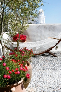 Mansion Sophia courtyard with beautiful flowers in Megalochori Santorini