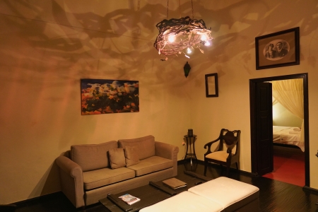 Living room night photo of Mansion sophia heritage villa in Megalochori Santorini