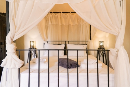 Master bedroom detail of Mansion sophia heritage villa in Megalochori Santorini